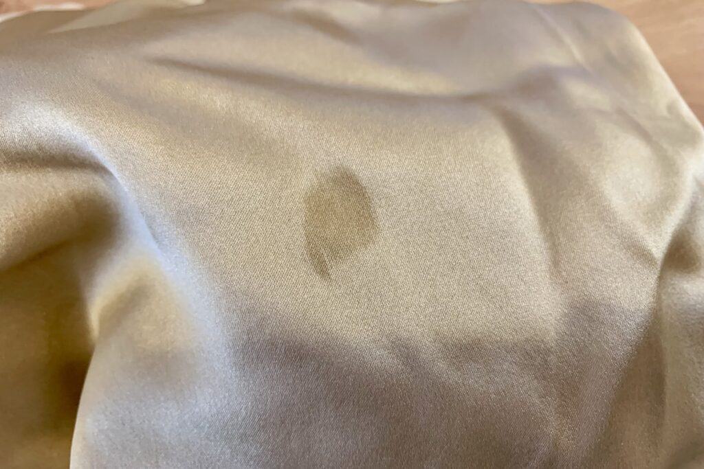 visible stain on silk textile